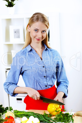 Woman cooking fresh meal at home