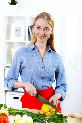 Woman cooking fresh meal at home