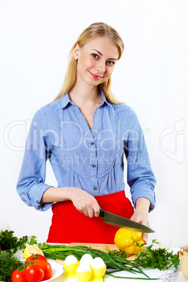 Woman cooking fresh meal at home