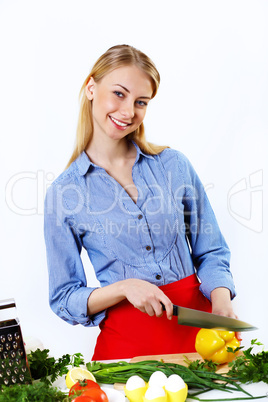 Woman cooking fresh meal at home