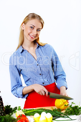 Woman cooking fresh meal at home