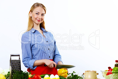 Woman cooking fresh meal at home