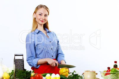 Woman cooking fresh meal at home