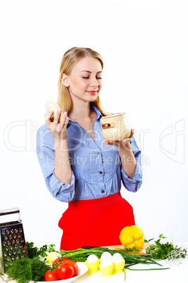 Woman cooking fresh meal at home