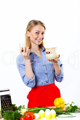 Woman cooking fresh meal at home