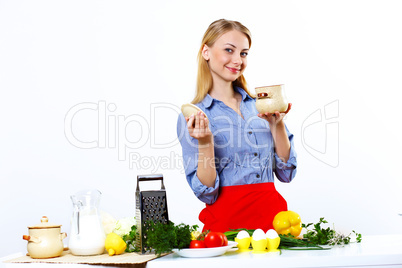 Woman cooking fresh meal at home