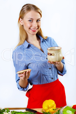 Woman cooking fresh meal at home