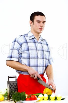 Man cooking fresh meal at home