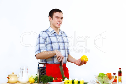 Man cooking fresh meal at home