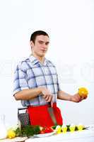 Man cooking fresh meal at home