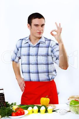 Man cooking fresh meal at home