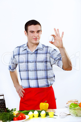 Man cooking fresh meal at home