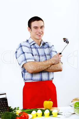 Man cooking fresh meal at home