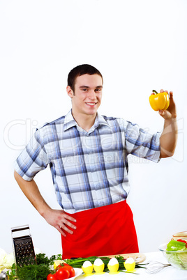 Man cooking fresh meal at home