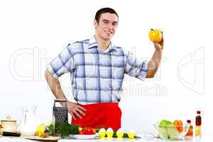 Man cooking fresh meal at home