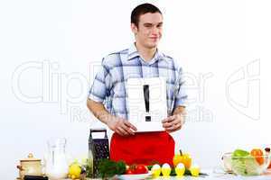 Man cooking fresh meal at home