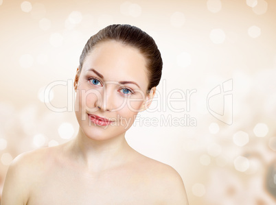 Studio portrait of young beautiful woman