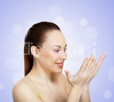 Studio portrait of young beautiful woman