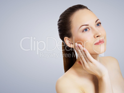 Studio portrait of young beautiful woman