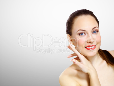 Studio portrait of young beautiful woman