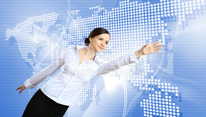 Woman in business wear with technology background