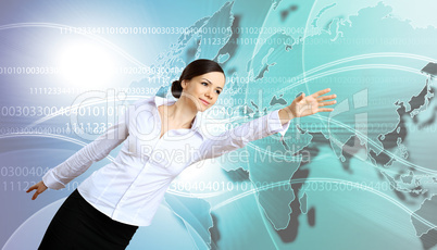 Woman in business wear with technology background