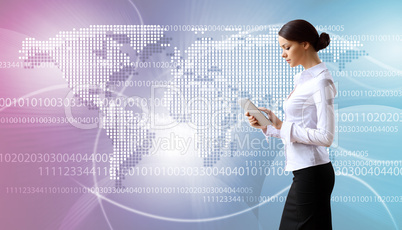 Woman in business wear with technology background