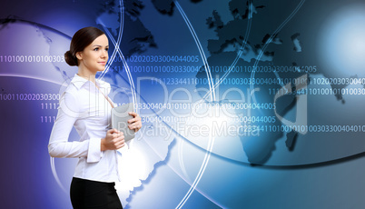 Woman in business wear with technology background