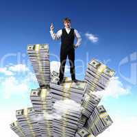 Young businessman with money symbols