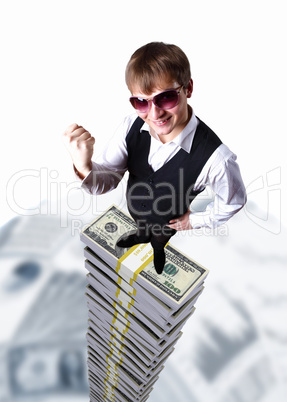 Young businessman with money symbols