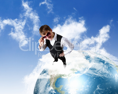 Young businessman and our planet earth