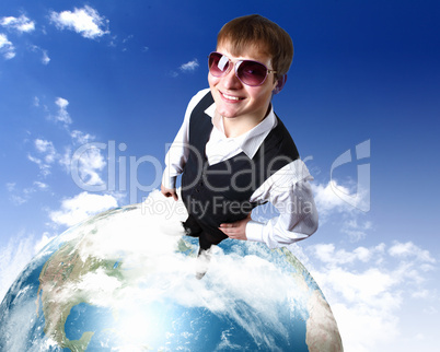 Young businessman and our planet earth