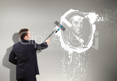 Businessman with a paint brush and banknote