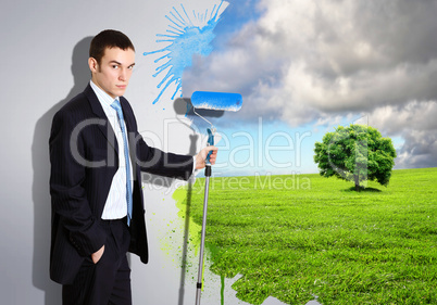 Young businessman and nature background