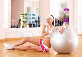 Young woman doing sport in gym