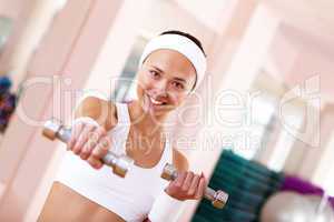 Young woman doing sport in gym