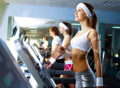 Young woman doing sport in gym