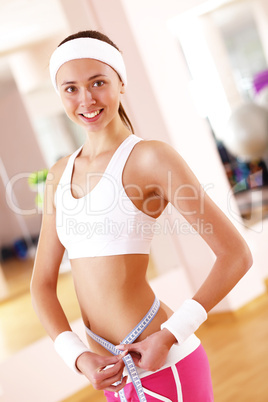 Young woman doing sport in gym