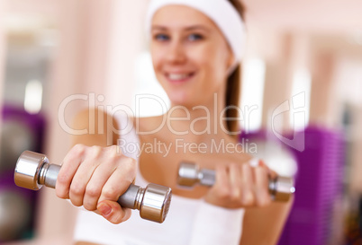 Young woman doing sport in gym