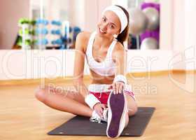 Young woman doing sport in gym