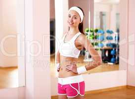 Young woman doing sport in gym