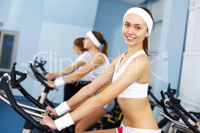 Young woman doing sport in gym