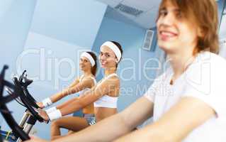 Young man doing sport in gym