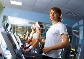 Young man doing sport in gym