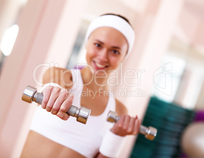 Young woman doing sport in gym