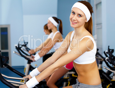 Young woman doing sport in gym