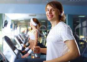 Young man doing sport in gym