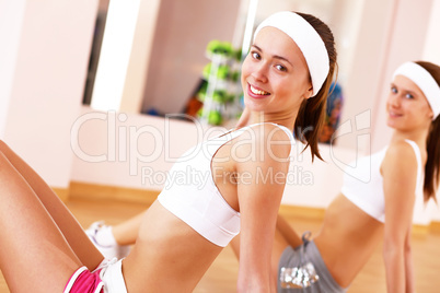 Young woman doing sport in gym