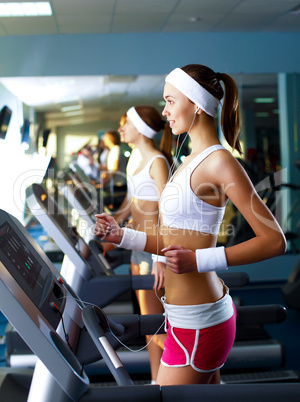 Young woman doing sport in gym