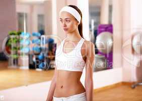 Young woman doing sport in gym